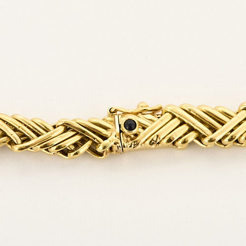 Collier Collier en Or jaune 18k à maille chevrons 58 Facettes CHANT0009