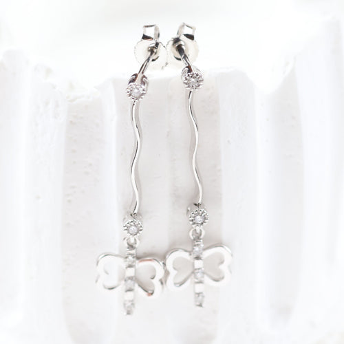 Boucles d'oreilles Longues boucles d'oreilles en or blanc 18 carats serties de diamants taille brillant 58 Facettes VV1-E