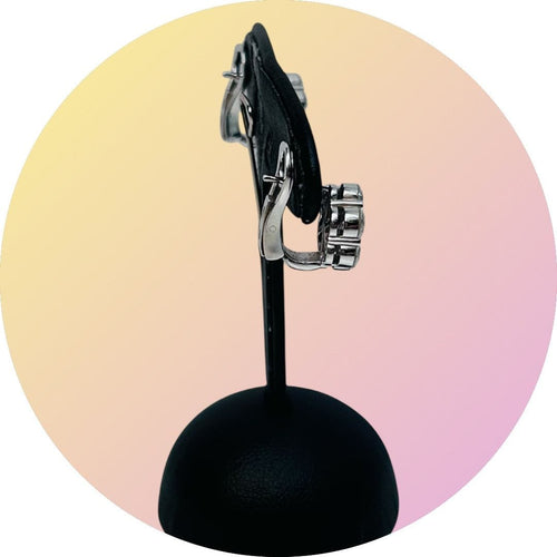 White gold and diamond daisy ear clips