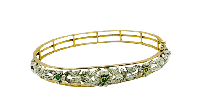 Bracelet Bracelet en or jaune orné de motifs floraux en argent, émeraudes et diamants 58 Facettes 50319
