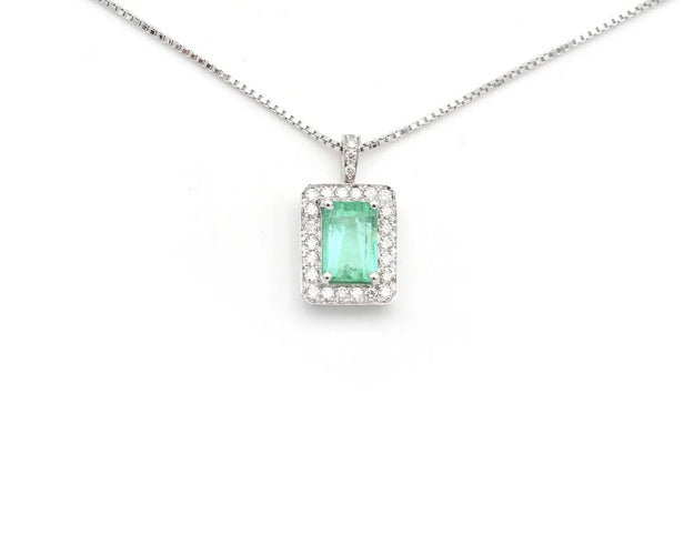 Collier Collier en or blanc avec émeraudes et diamants 58 Facettes 14501