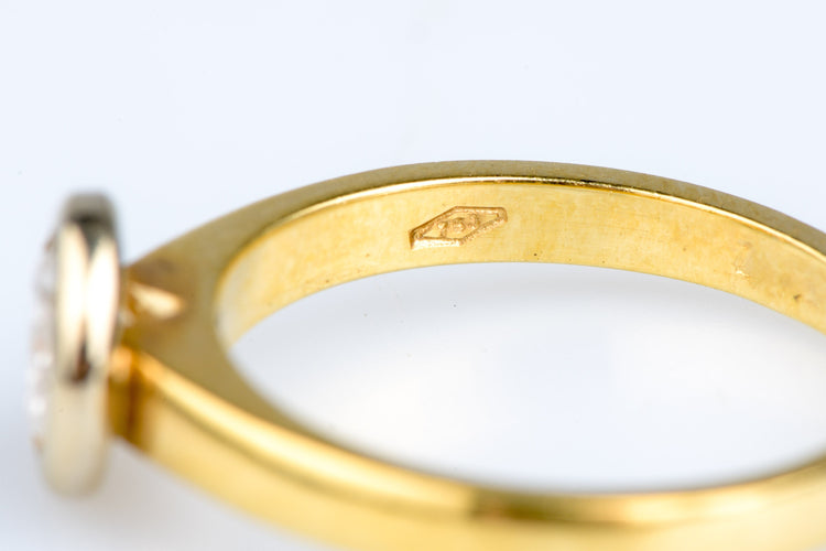 Bague 54 Bague solitaire en or jaune, serti clos d’un diamant rond brillant o,70 ct 58 Facettes 312231