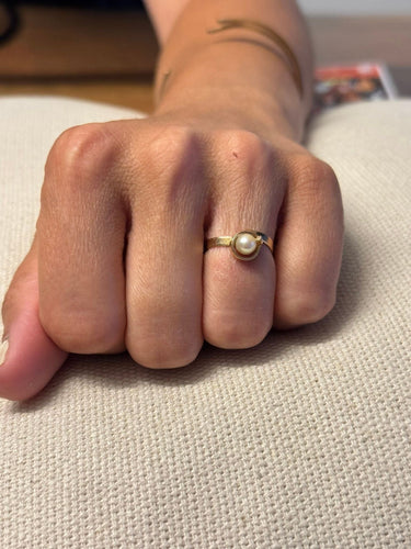 Bague 52 Bague en or jaune et perle 58 Facettes