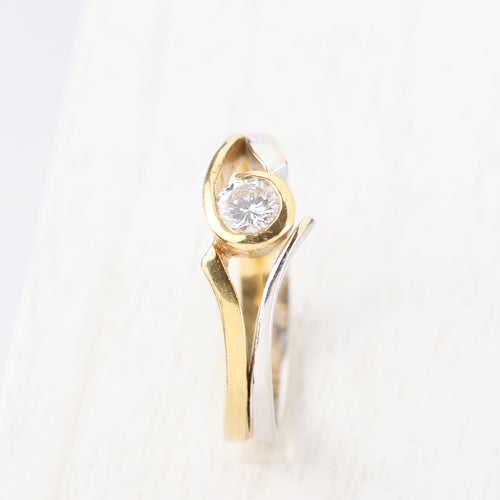 Bague 55 Solitaire bicolore avec diamant taille brillant 58 Facettes 129595