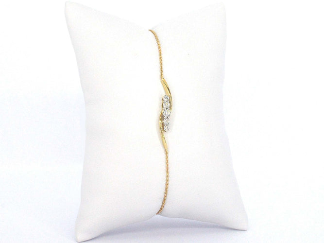 Bracelet Bracelet en or jaune avec diamants sertis en rang 58 Facettes 2361