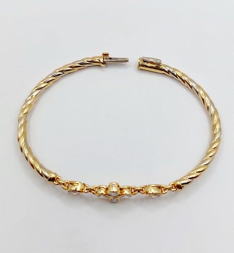 Bracelet Bracelet art déco trois or jaune torsadé et diamants 58 Facettes A05734