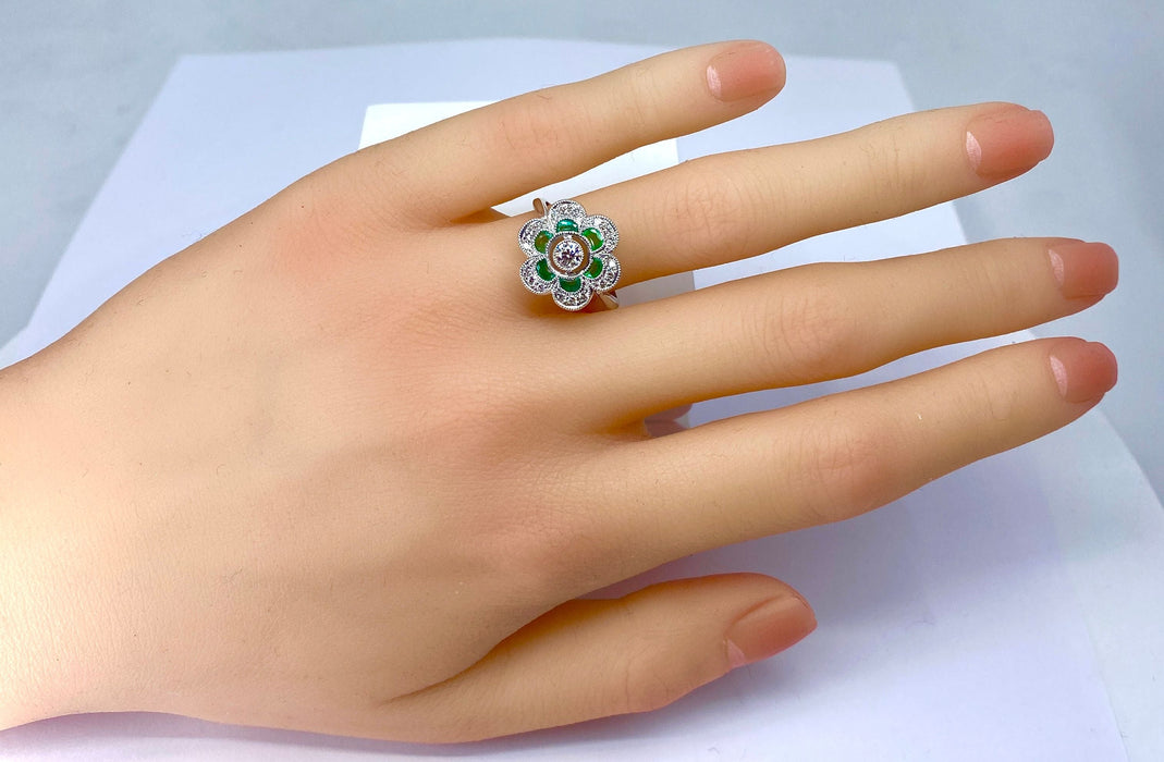 White gold, emerald and diamond ring