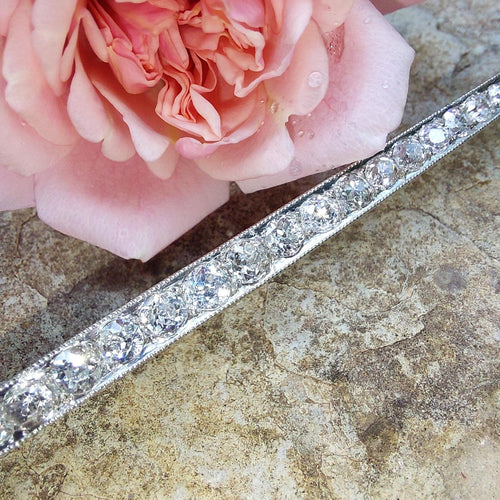 Broche Longue broche barrette platine et diamants 58 Facettes 31
