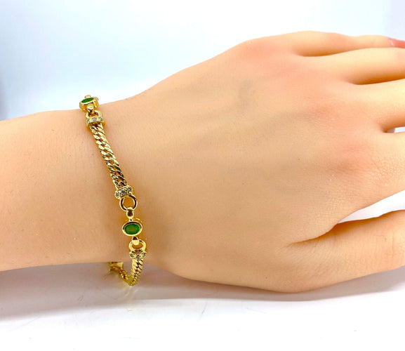 Bracelet Bracelet en or jaune 18 carats, emeraudes et diamants 58 Facettes AB362