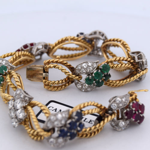 Bracelet Bracelet en or jaune orné de diamants et de pierres de couleur 58 Facettes