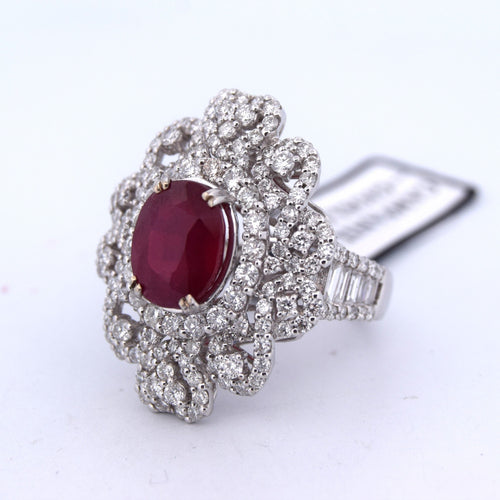 Bague 54 Bague en or blanc avec rubis, diamants et baguettes 58 Facettes