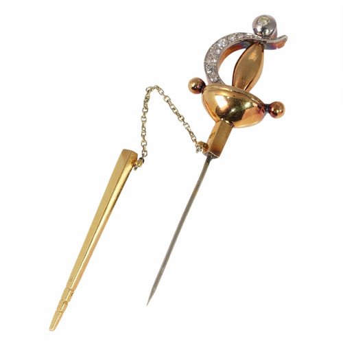 Broche Une broche épée vintage ornée de diamants : une traversée du temps et de la mode 58 Facettes 24246-0390