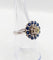 Bague 51.5 Bague marguerite Art Déco or blanc, diamant taille ancienne 0,65 carat et saphirs 58 Facettes A06329