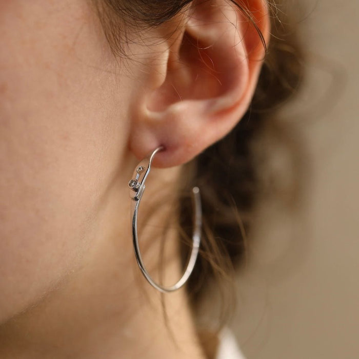 Boucles d'oreilles DINH VAN  - Boucles d'oreilles Serrure Or Gris avec diamants 58 Facettes