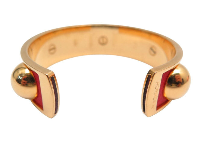 Bracelet bracelet HERMES jonc en cuir rouge et metal dore red  en 58 Facettes 272251