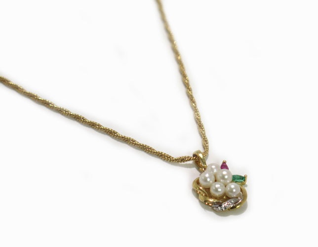 Oude hanger met smaragd, robijn en parels 