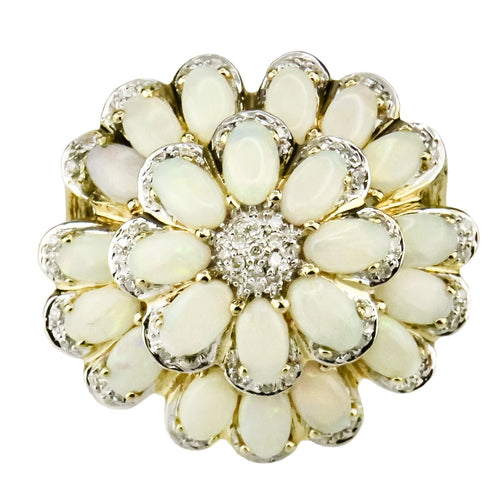 Bague 60.5 Magnifique bague en or 14 carats en forme de fleur ornée d'opales lumineuses 58 Facettes 2572