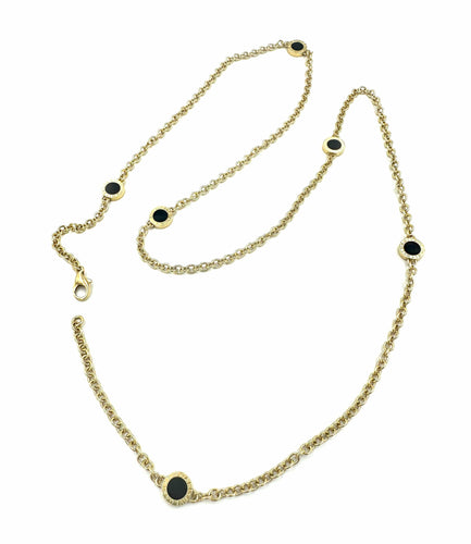 Collier BVLGARI. Sautoir "BVLGARI-BVLGARI" or jaune et onyx 58 Facettes