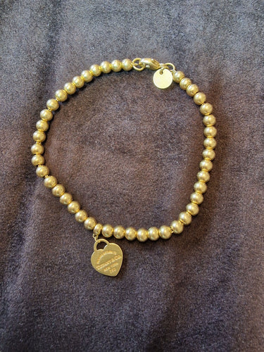 Bracelet Tiffany&Co - Bracelet de perles Heart Tag en or jaune 58 Facettes