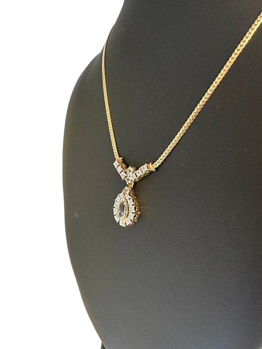 Collier Collier en or blanc et jaune avec diamants et aiguemarine 58 Facettes