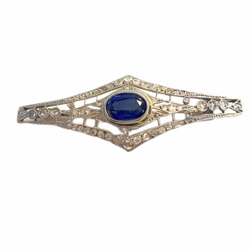 Broche Broche Art Déco des années 1930 en or 18 kt et platine avec diamants et saphir synthétique 58 Facettes A2602