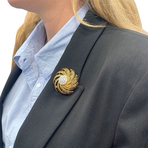 Broche Broche Cartier en or jaune et diamants. 58 Facettes 31850