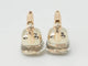 Boucles d'oreilles Boucles d'oreilles Pomellato en or rose et Topaze blanche 58 Facettes 33436