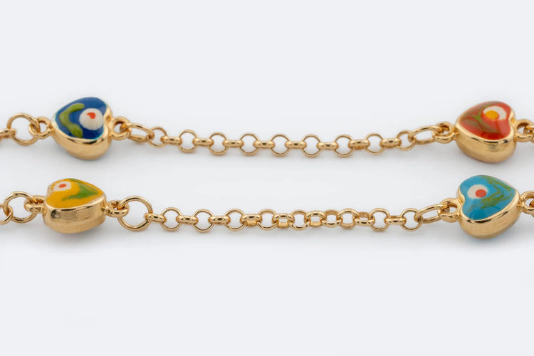 Bracelet Oro Giallo Bracelet en or jaune avec petits coeurs 58 Facettes 194,00 BRC