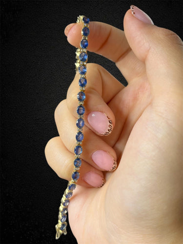 Bracelet Bracelet tennis en or jaune avec saphirs et diamants 58 Facettes