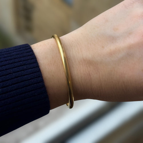 Bransoletka otwierana typu mankiet średni model z żółtego złota 18k 