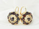 Boucles d'oreilles Boucles d'oreilles dormeuses en or jaune et grenat 58 Facettes 33473