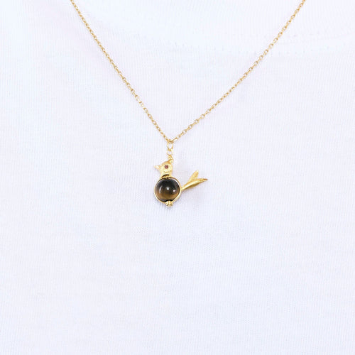 Pendentif Pendentif oiseau en or jaune et oeil de tigre 58 Facettes PAL30434