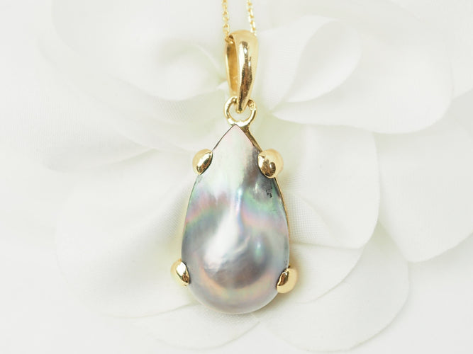 Pendentif Pendentif Mabé de Tahiti en or jaune 58 Facettes 33335