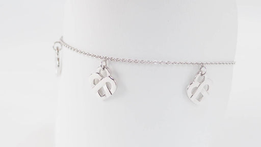 Bracelet Bracelet Poiray Coeur Entrelacé en or blanc 58 Facettes 32973