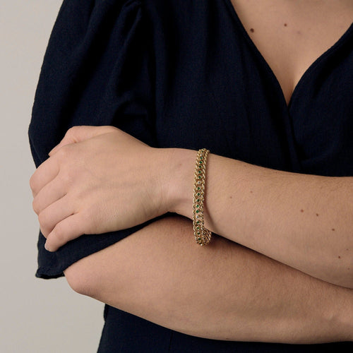 Bracelet Elegant Bracelet en or jaune, diamants et émeraudes 58 Facettes B250662