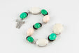 Bracelet Bracelet or gris serti de corail blanc et de chrysoprases 58 Facettes 175307