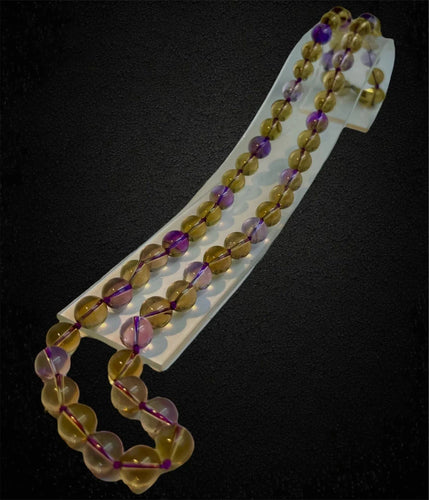 Collier Collier de perles alternées de quartz améthyste et de citrine 58 Facettes
