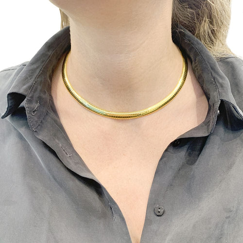 Vintage Omega yellow gold necklace.