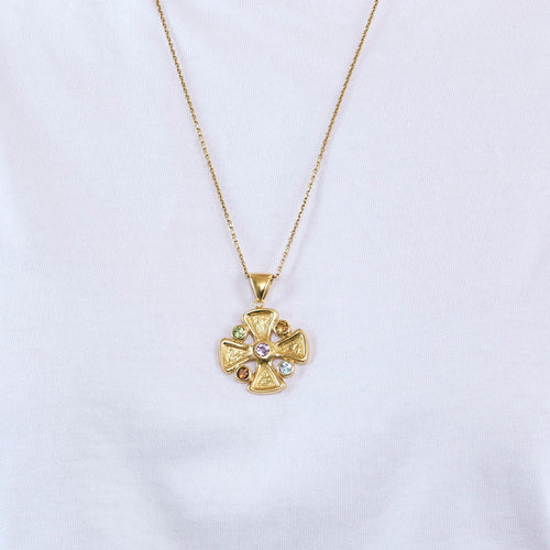 Pendentif Pendentif croix en or jaune, améthyste, péridots, citrine et topaze 58 Facettes CAN10981