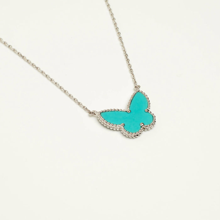 Collier Van Cleef & Arpels - Très Rare Collier Lucky Alhambra Butterfly Turquoise en or blanc 58 Facettes