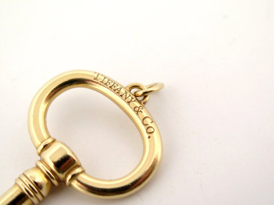 yellow gold tiffany key pendant for necklace