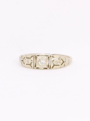 Geometrický prsten z bílého zlata s diamanty 