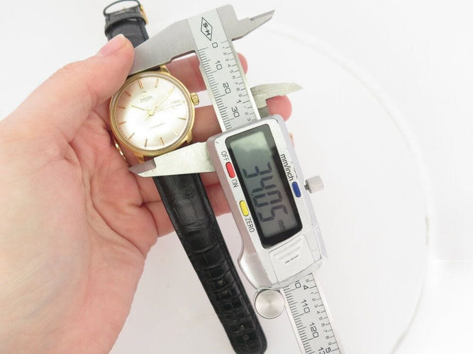 Montre vintage montre OMEGA seamaster automatique 34 mm en or jaune 18k 58 Facettes 267485