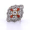Bague 57 Bague en platine et or jaune avec corail et diamants 58 Facettes