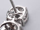 Boucles d'oreilles Boucles d'oreilles en or blanc avec trois chatons de diamants les uns en dessous des autres 58 Facettes 2110