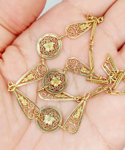 Collier Collier Art Nouveau or jaune motifs filigranés et fleuris (circa 1910) 58 Facettes A05217