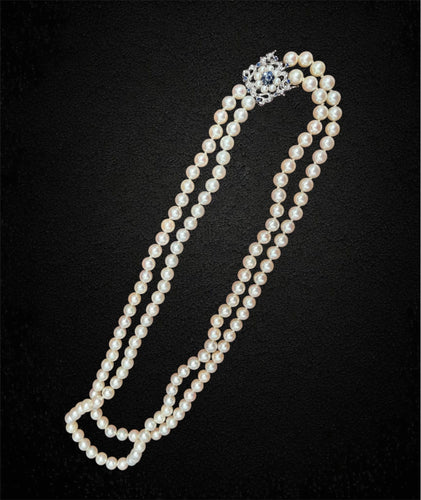 Collier Magnifique collier de perles à double rang 58 Facettes