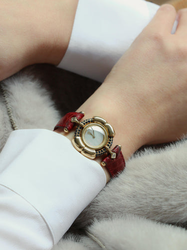 Montre RENE BOIVIN Montre Chrysalide or jaune rubis saphirs diamants 58 Facettes 1089.1