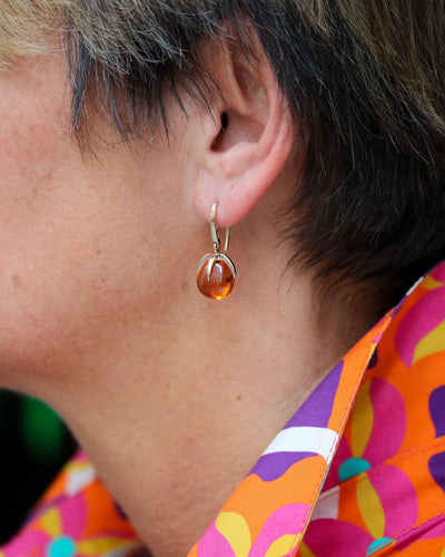 Boucles d'oreilles Paire de Boucles d'Oreilles signées "Pomellato" Or rose et Quartz de Madère 58 Facettes A11522