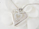 Collier Collier coeur en or blanc et diamants 58 Facettes 33084